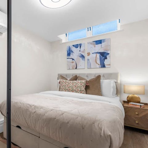 Sink into the comfortable bed after a busy day exploring London