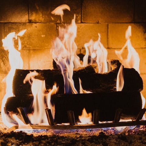 Warm up after wintry beach walks in front of the log burner