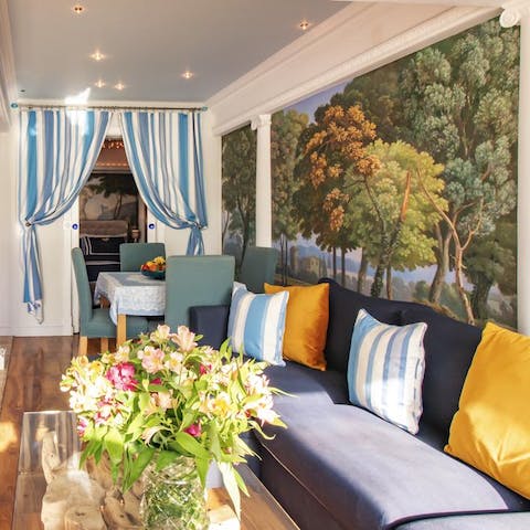 Admire the home's decorative wall mural