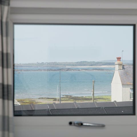 Gaze at the sea view from the comfort of the living room