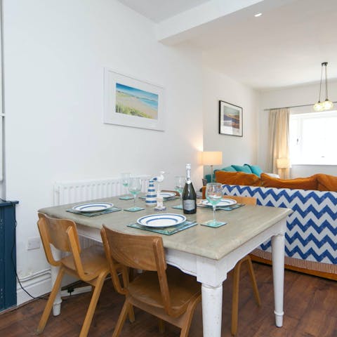 Enjoy a home-cooked meal around the intimate dining table