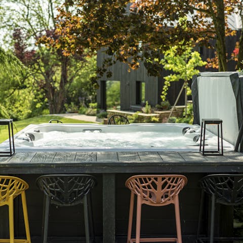 Soak under the stars in the outdoor hot tub
