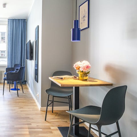 Enjoy some tasty smørrebrød at the dining table