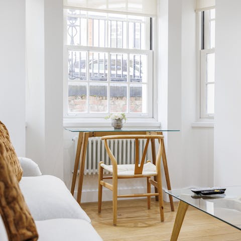 Get some work done at the desk in the window