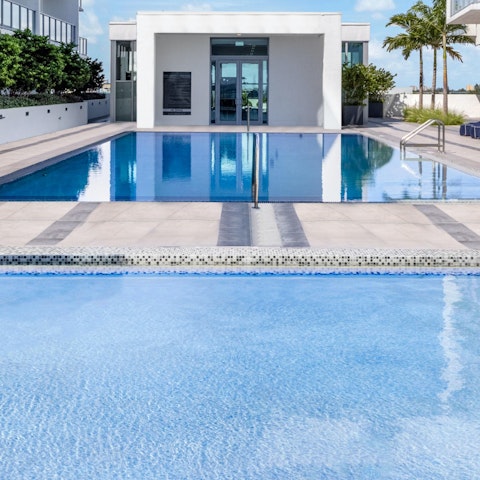 Relax and refresh in the shared resort-style pool