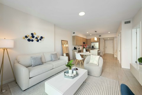 Spread out across a bright, airy living and dining area