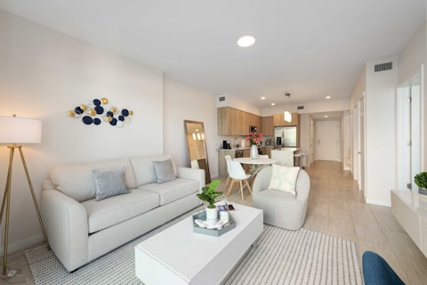 Spread out across a bright, airy living and dining area