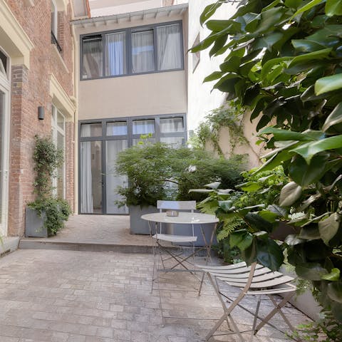 Wake up with coffee and croissants in the courtyard