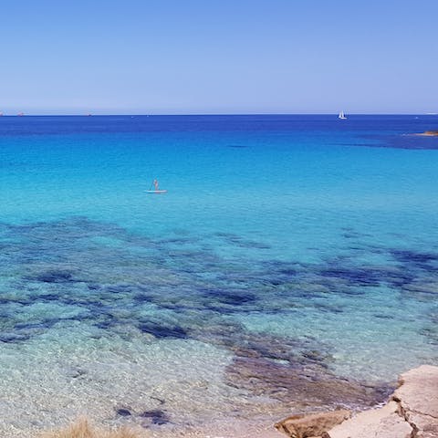 Visit Playa Del Muro and dip your toes in the ocean, only a thirty–one–minute drive away
