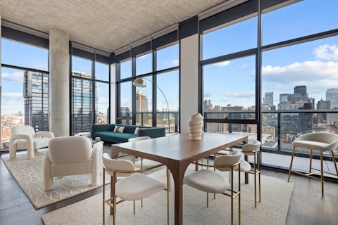 Dine with the Chicago skyline stretching across every wall