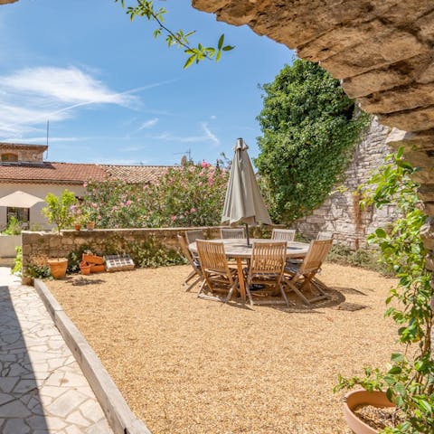 Dine alfresco in the quaint courtyard