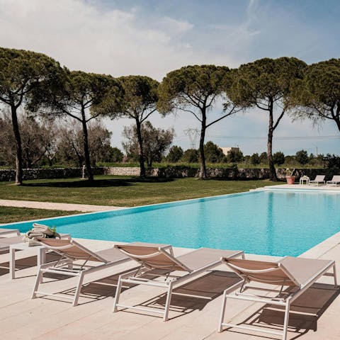 Dive into the private pool or doze in the shade of a tree