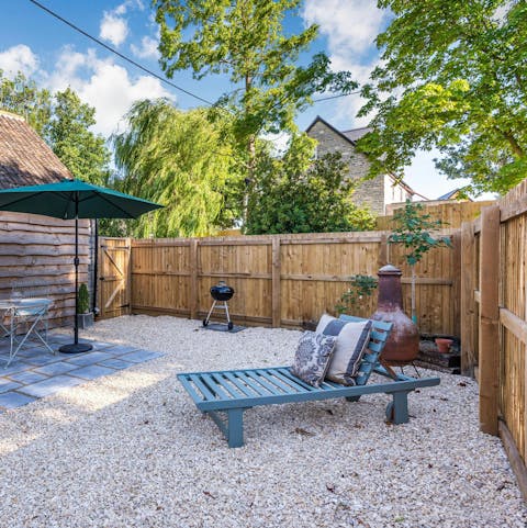 Enjoy a glass of cider in the enclosed garden