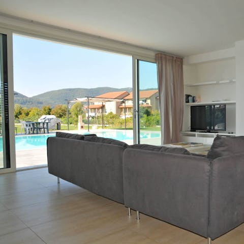Slide open the huge glass doors to blend indoors with outdoors