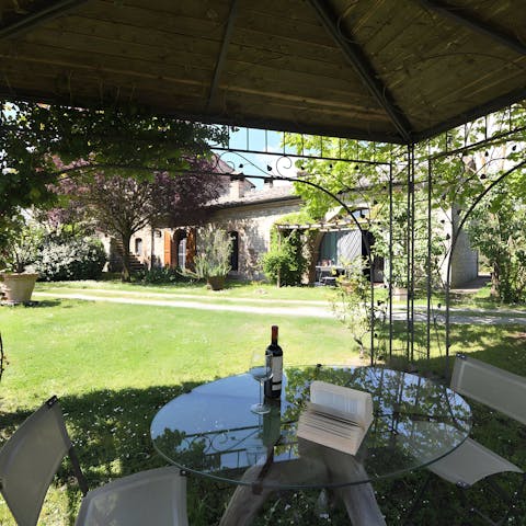 Find a quiet spot in the shade with your book and glass of wine