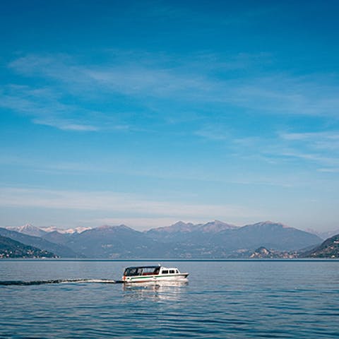 Take a boat ride on Lake Como to admire the scenery from the water