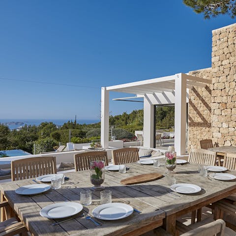 Dine alfresco overlooking the Mediterranean