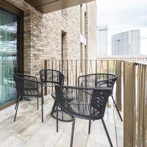 Bask in the natural light and fresh air from the balcony