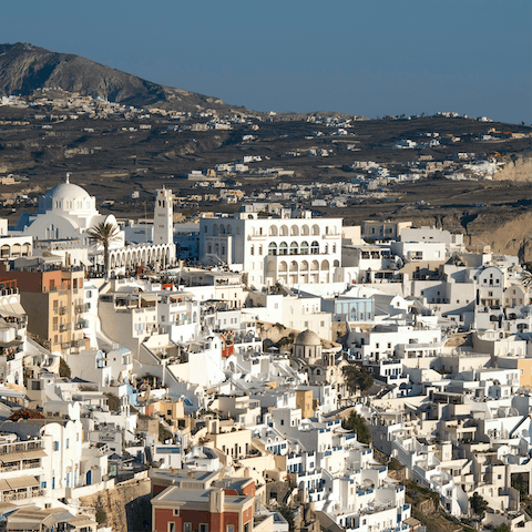 Explore the glorious town of Thera – you're a two-minute walk from its main square