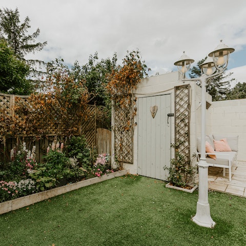 Spend time in the beautifully-kept garden with outdoor seating and a barbecue
