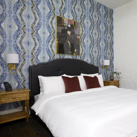 Embrace the jazzy nature of the city in the master bedroom