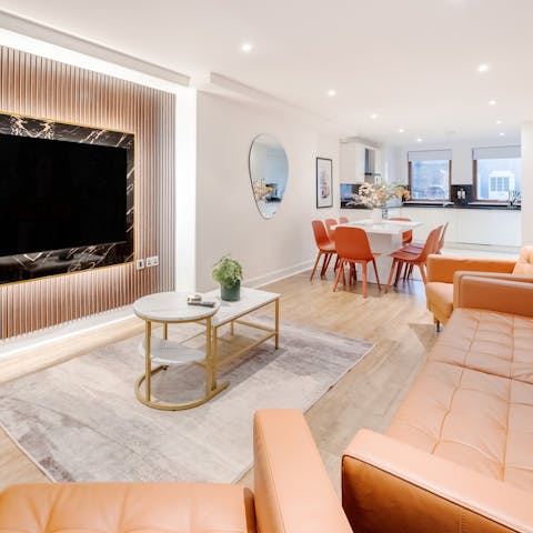 Gather for movie nights in front of a 70-inch TV