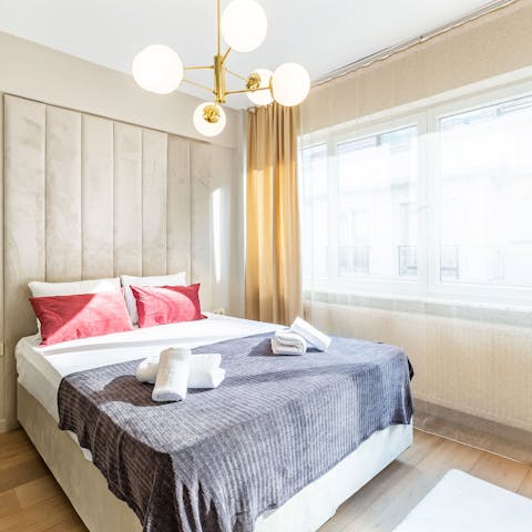 Wake up from restful slumbers in your plush bedroom