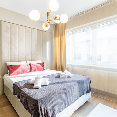 Wake up from restful slumbers in your plush bedroom