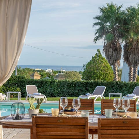 Enjoy breakfast on the terrace as you drink in the distant sea views