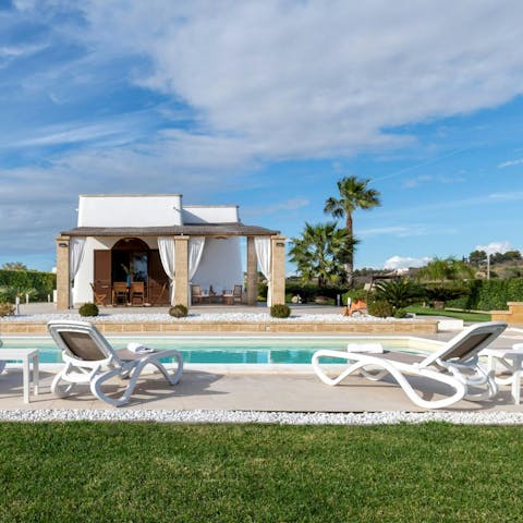 Soak up the sun from beside the private pool