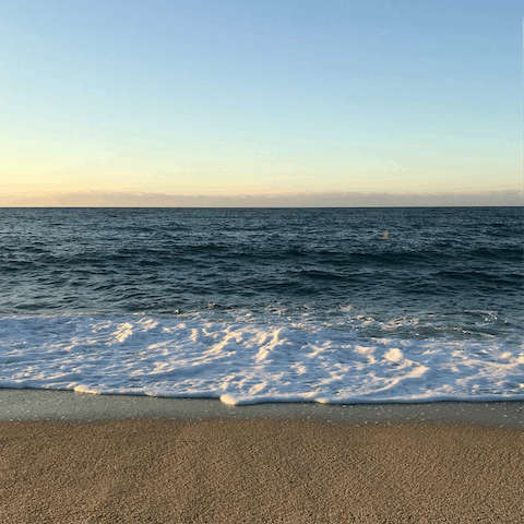Catch the sun set down at Santa Maria Beach, just a short stroll away