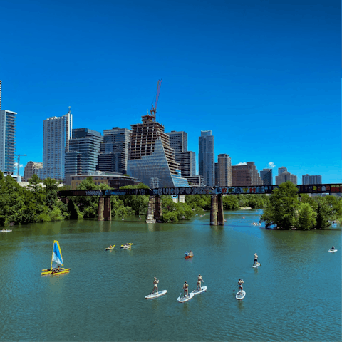 Drive five minutes to the shores of the Colorado River, then paddle along to Lady Bird Lake