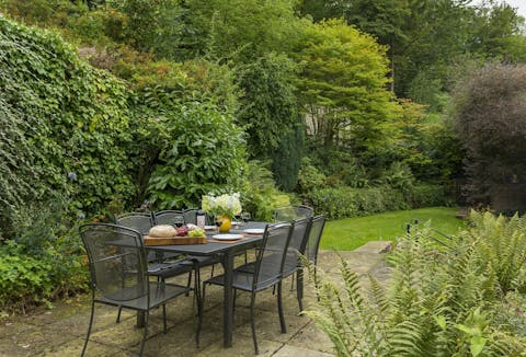 Enjoy sunny mornings of continental breakfasts in the lush garden
