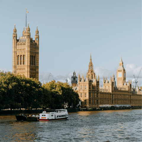 Cruise down the Thames on a riverboat, heading towards Big Ben