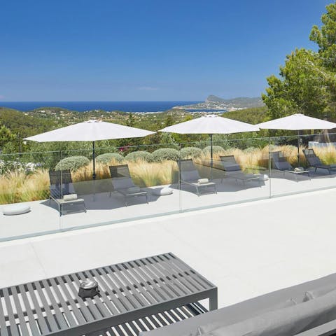 Gather on the spacious terrace and admire the coastal views