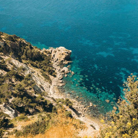 Explore the sandy beaches and clifftops of Ibiza's west coast