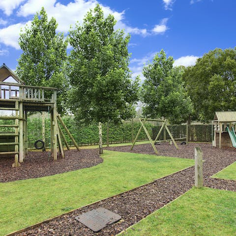 Let little ones run off some energy in the shared playground