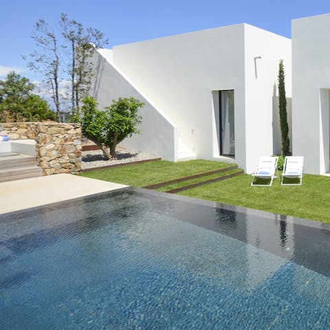Bask in the sun by the pool