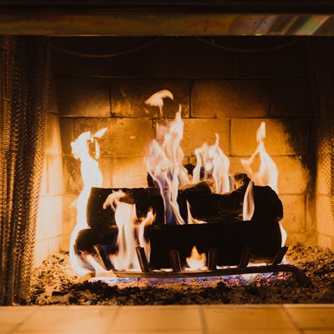 Spend cosy evenings snuggled up next to the traditional fireplace
