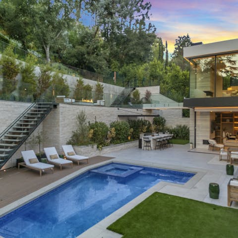 Spend blissful afternoons relaxing by the pool