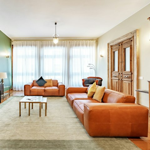 Soak up the city atmosphere from the floor-to-ceiling windows