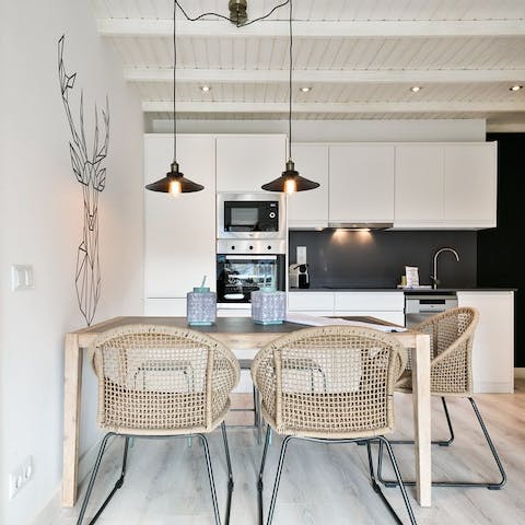 Treat yourself to a fresh cup of coffee at the rustic dining table