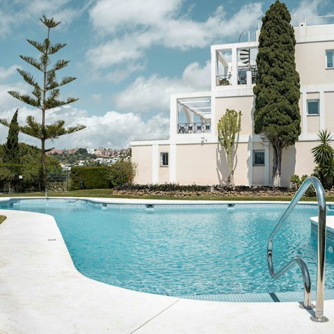 Dive into the communal pool to beat the heat