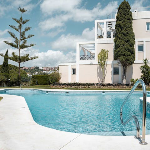 Dive into the communal pool to beat the heat