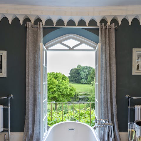 Enjoy a long soak with a Devonshire view