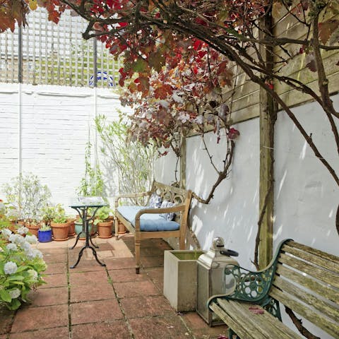 Relax in the quaint garden with your holiday read
