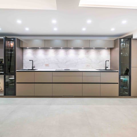 Prepare meals in the sleek and contemporary kitchen