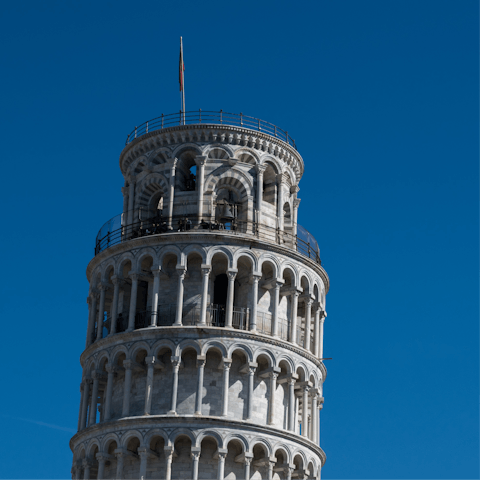 Take a drive to see the iconic Leaning Tower of Pisa