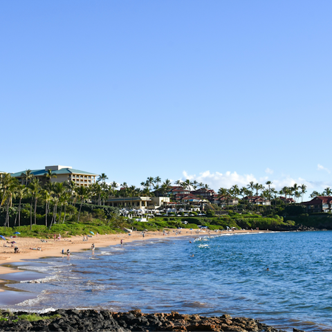 Enjoy a day of sea, sand and sun on Wailea Beach, a short stroll away