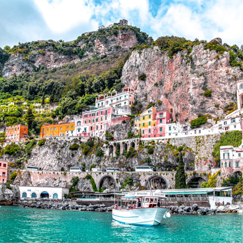 Explore the scenic towns and secret coves of the Amalfi Coast